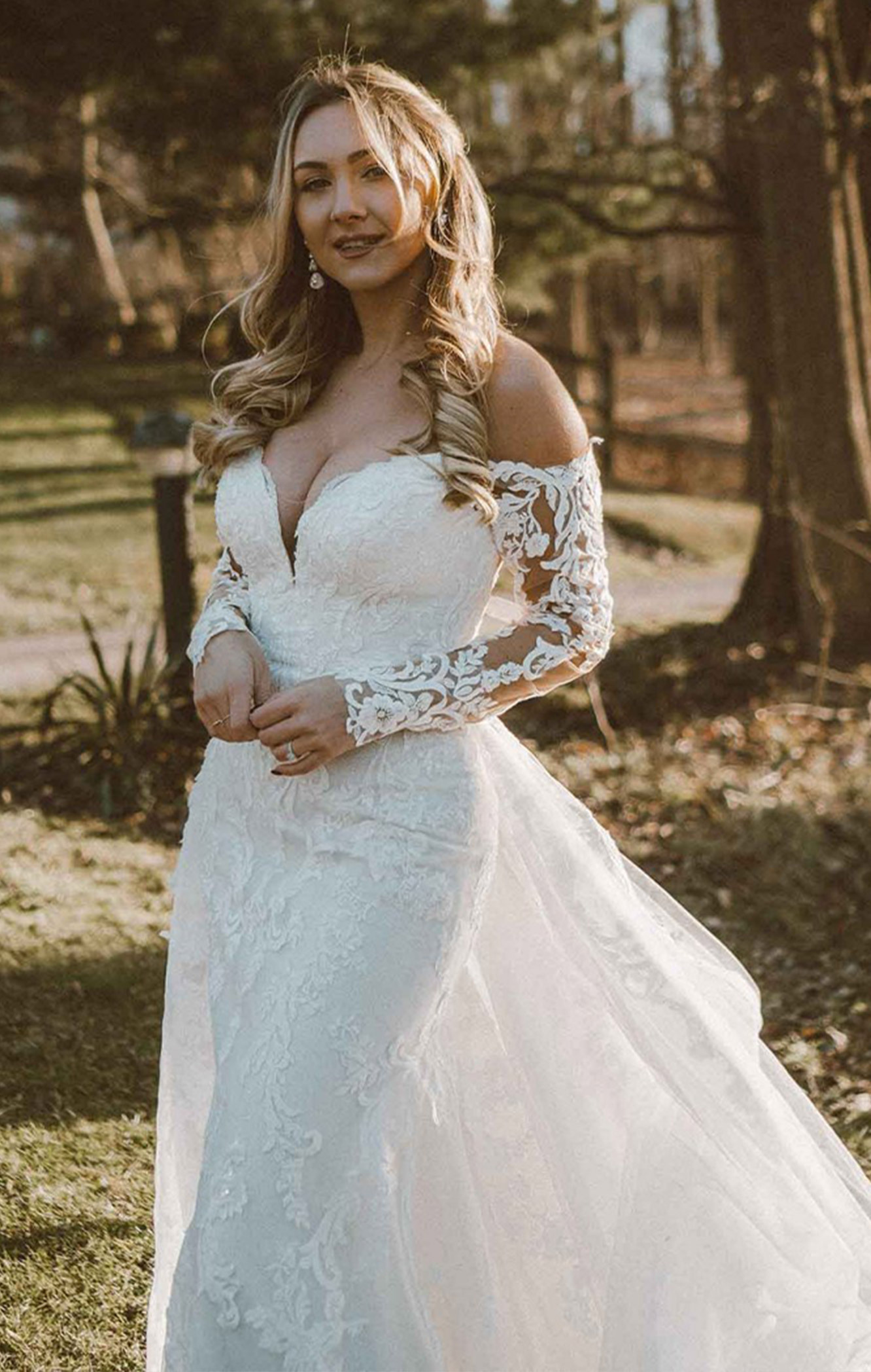 Model in white Martina Liana Wedding dress