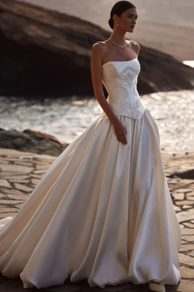 Model in white Milla Nova wedding dress