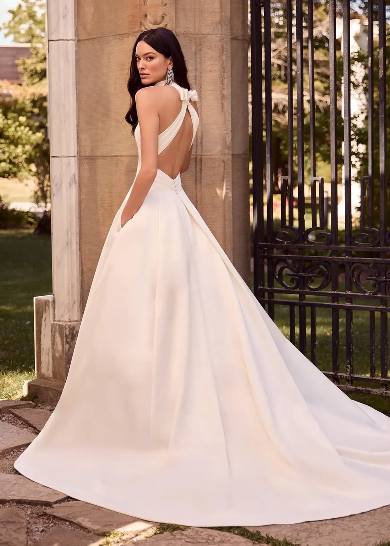 Model wearing Paloma Blanca wedding gown