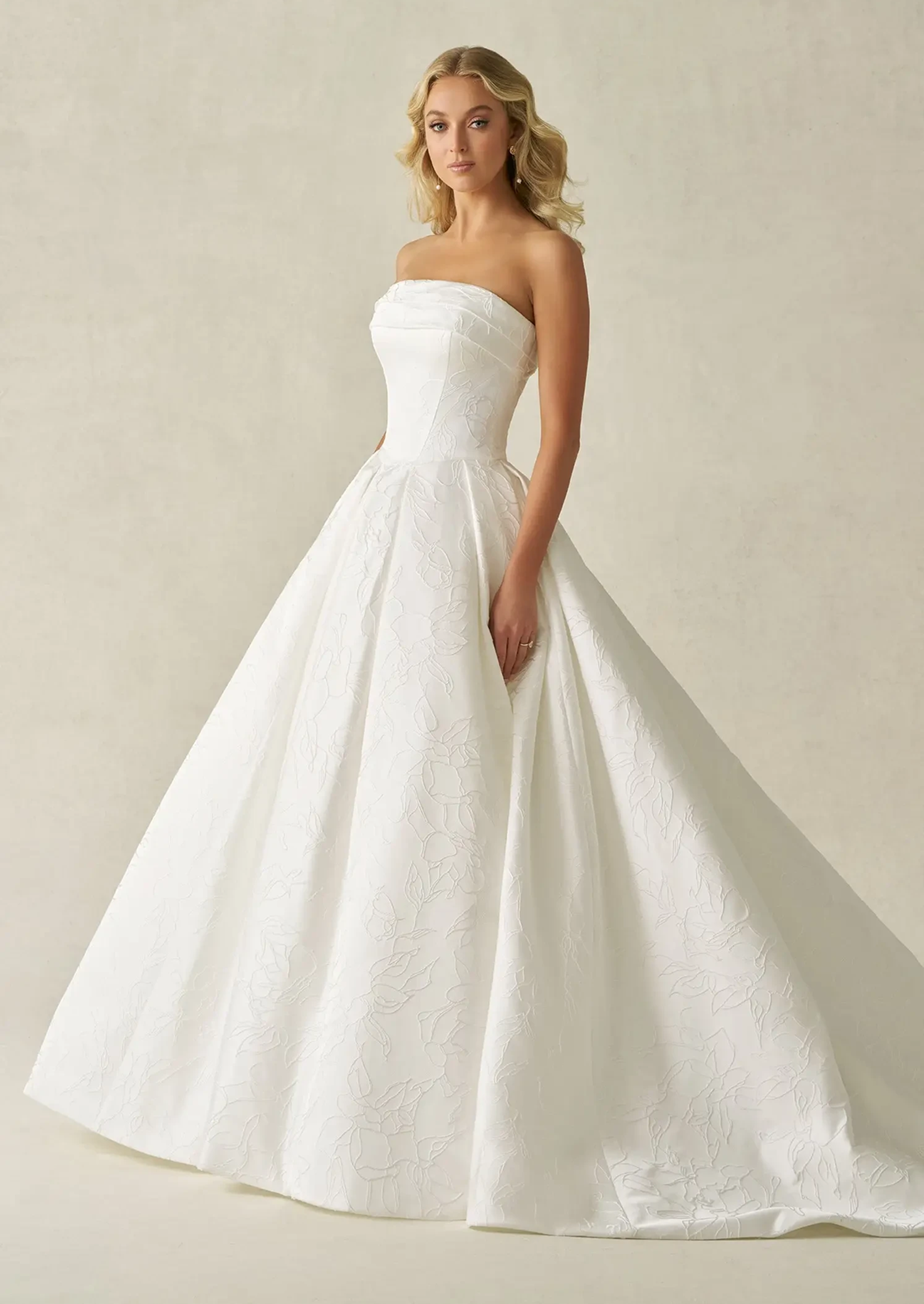 Model wearing Allure Bridals wedding gown