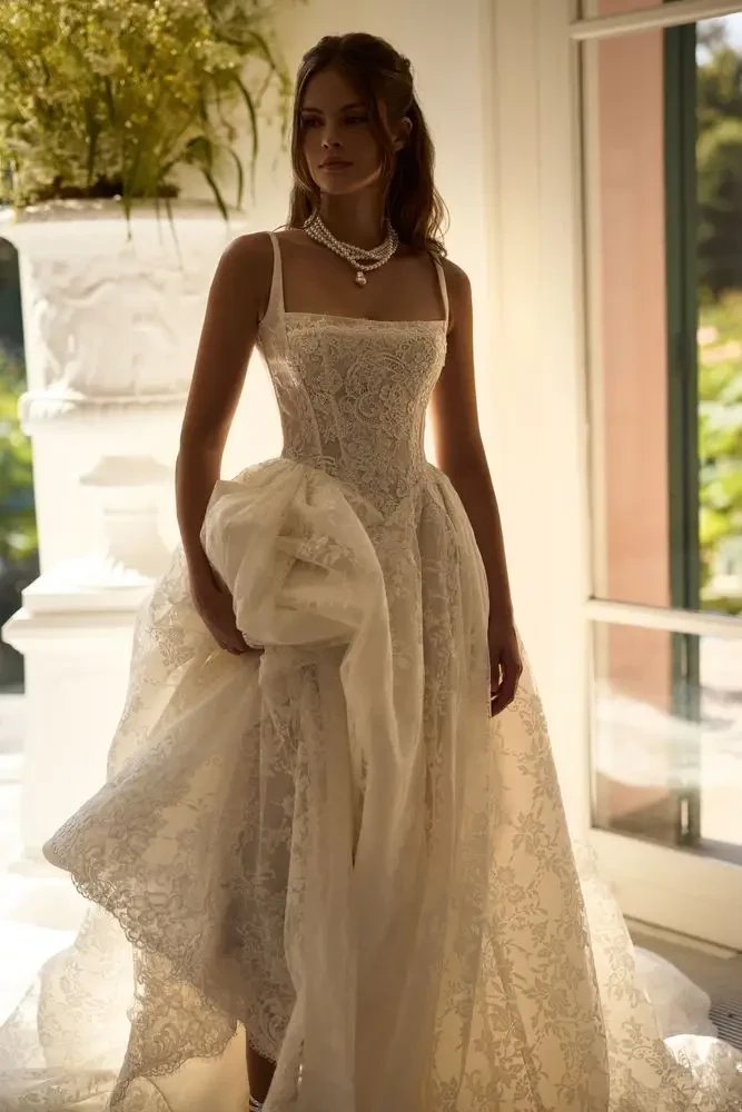 Model wearing Milla Nova wedding gown