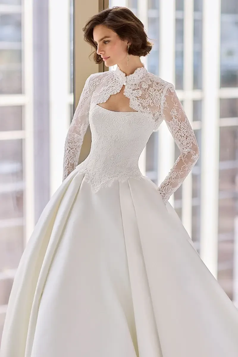 Model wearing Paloma Blanca wedding gown